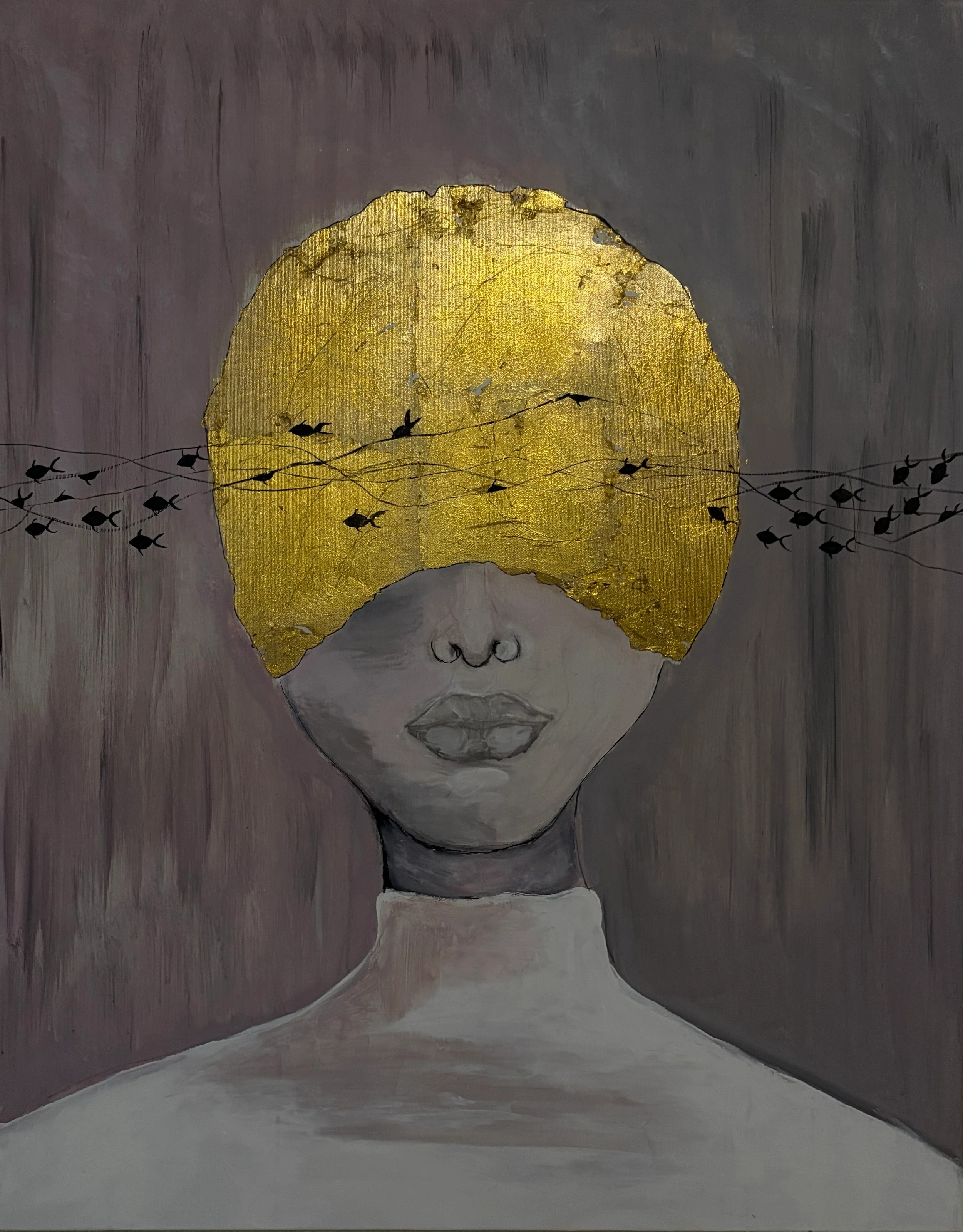 A pale face with gold covering the upper head, crossed by a horizontal row of small fish.
